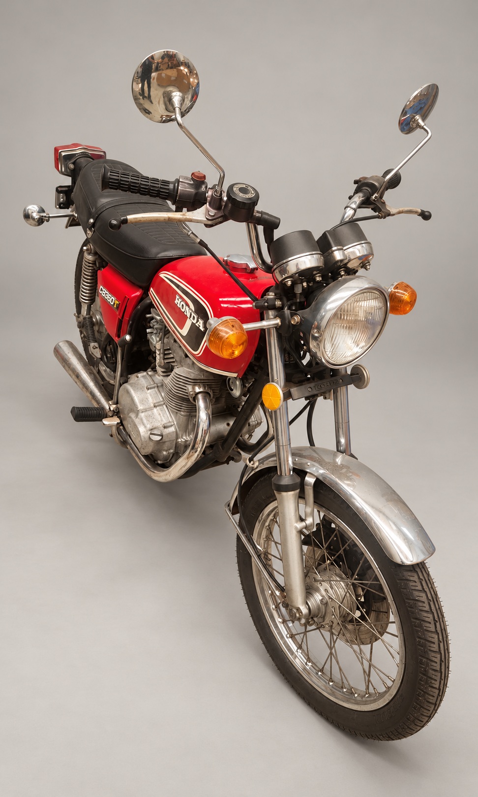 Red 1975 Honda CB360T — Front three-quarter view