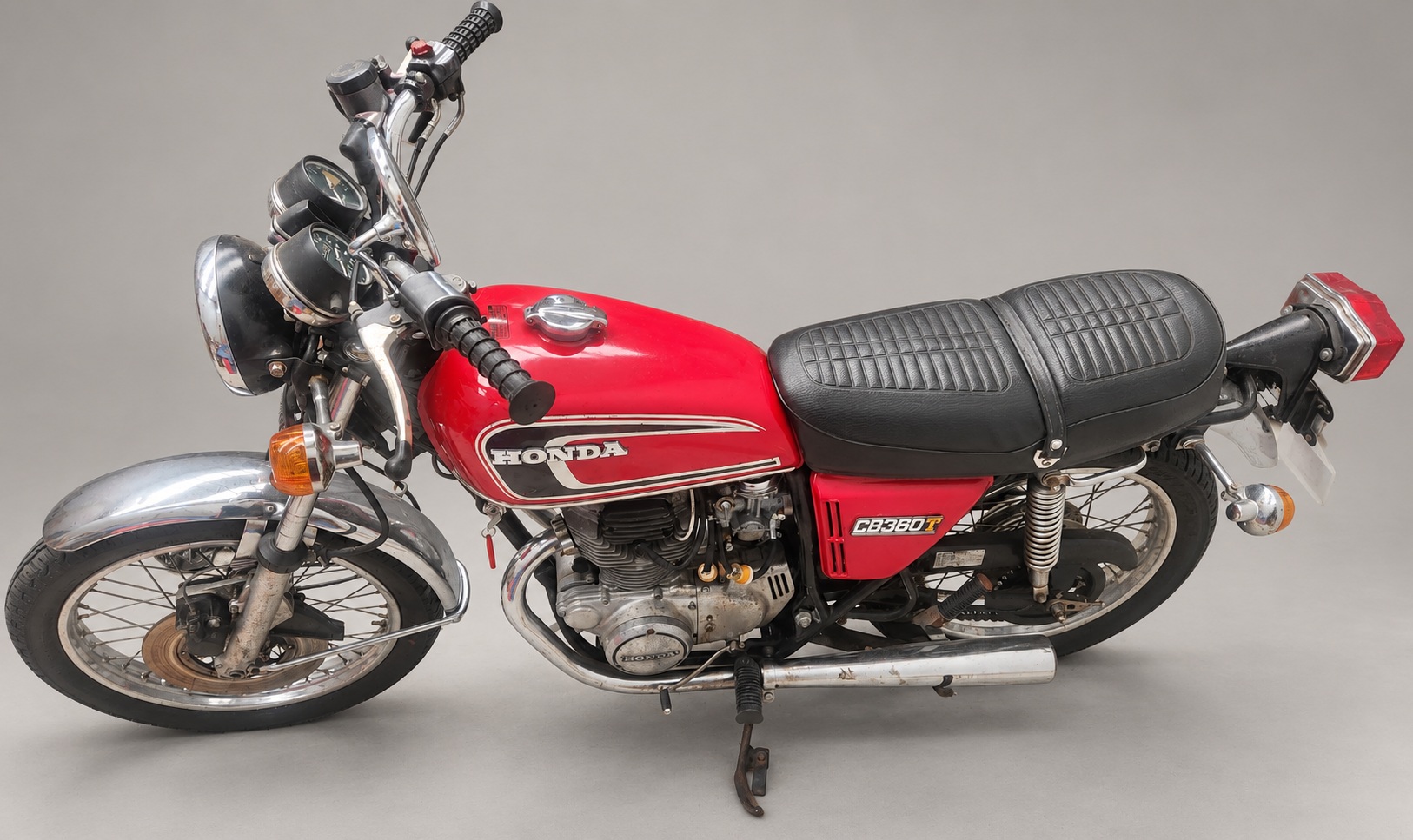 Red 1975 Honda CB360T — Left-side angled view
