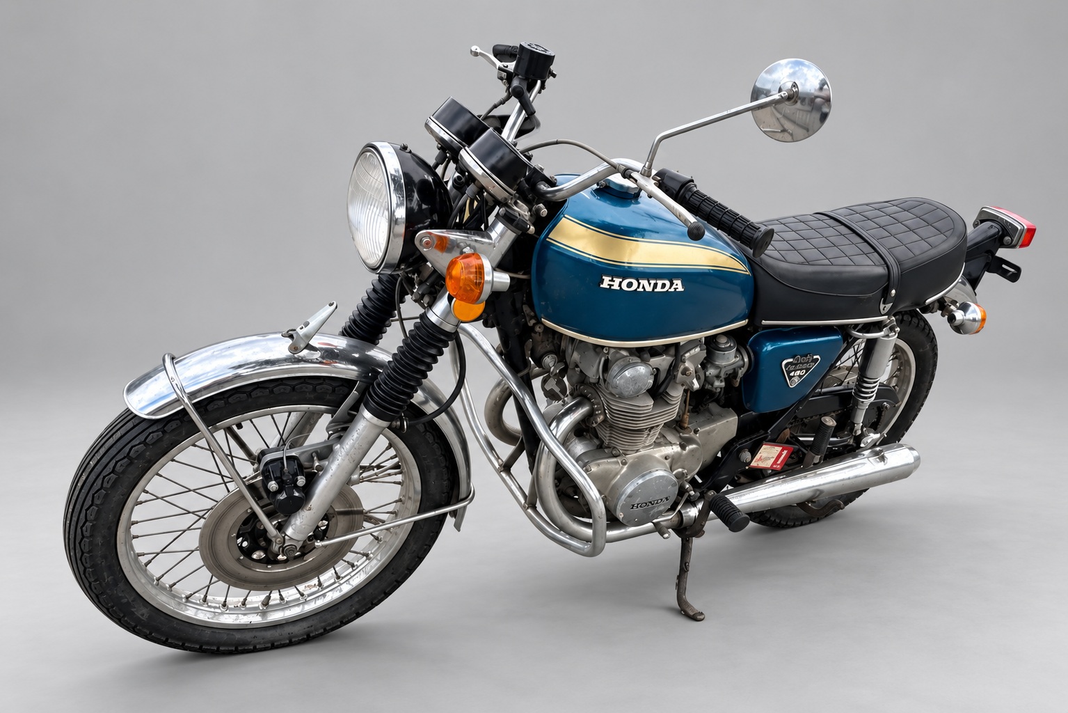 Blue and gold 1972 Honda CB450 — Front left three-quarter view
